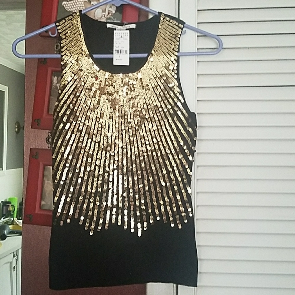Sequin sleeveless top. New never worn.
